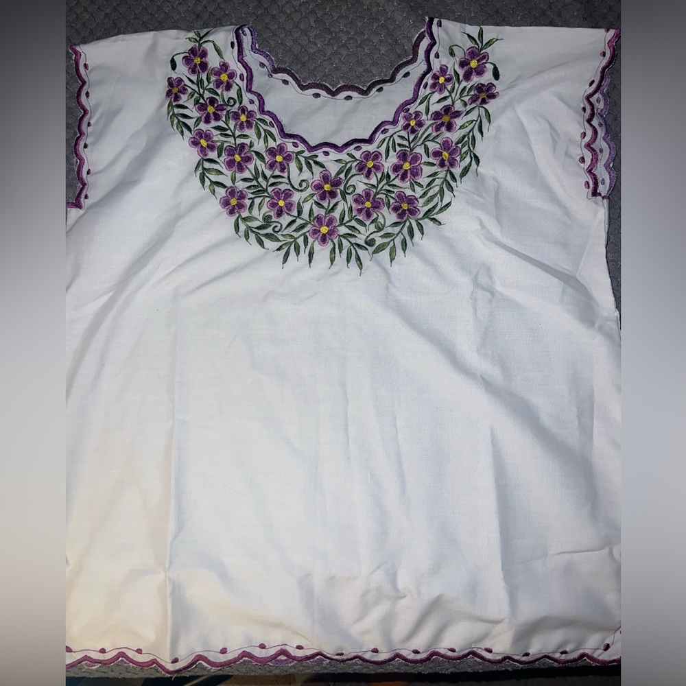 Hand broidered shirt from Yuctan, Mexico from local Mayan women.